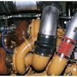 This Caterpillar Acert dual turbo arrangement has typical high- and low-pressure hoses that prevent combustion air from leaking out while helping to protect engines from airborne dust.