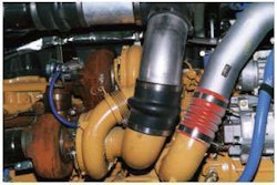 This Caterpillar Acert dual turbo arrangement has typical high- and low-pressure hoses that prevent combustion air from leaking out while helping to protect engines from airborne dust.