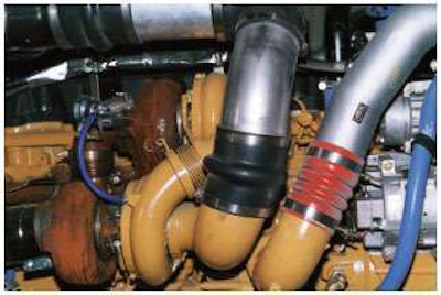 This Caterpillar Acert dual turbo arrangement has typical high- and low-pressure hoses that prevent combustion air from leaking out while helping to protect engines from airborne dust.