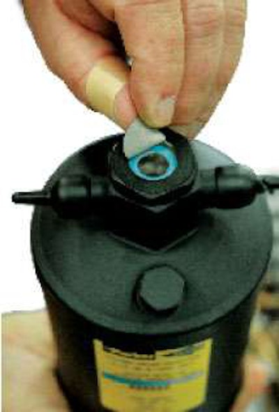 The sight glass on a receiver-dryer can provide instant diagnostics. A blue dot on the moisture indicator means everything is dry, while pink, white or gray indicates moisture or acid in the system.