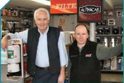 Jim Pascale (left) is president of Pascale Service Corporation, a business started by his father, Frank. Here, he and Mike Toye, the company’s parts manager, stand in the showroom of the their Pawtucket, R.I. headquarters.