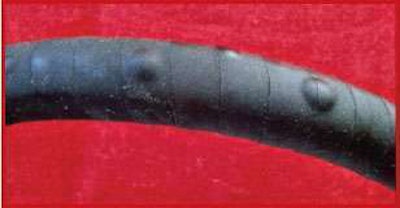 Blistering occurs when a hose is incompatible with the fluids that flow through it.