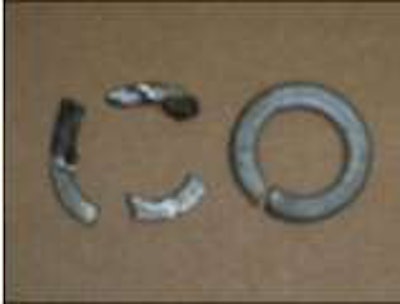 The lock nut washer on the left was found to have caused much of the damage to the gear teeth. It should have looked like the one on the right.