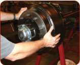 Only after the drum is inspected for hairline cracks, hot spots and other problems, should it be installed over the hub.