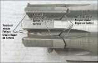 Figure 5: Torsional shear cracks and surface initiated torsional tensile fatigue cracks are visible.