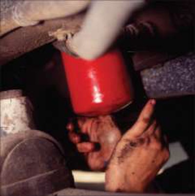 Replacing an oil filter is just one of several steps to an effective lubrication procedure. After an old filter is removed, it is important to lubricate a new filter with oil before installing it on the truck.