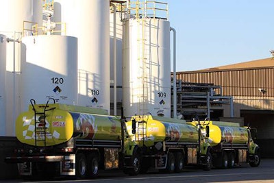 Trucks wait to unload oil at Safety Kleen’s re-refinery facility in East Chicago, Ind. Safety Kleen brings in used oil from throughout North America to re-refine its plant.