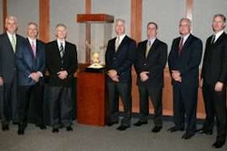 MHC Kenworth – Kansas City recently received the 2012 Kenworth Dealer of the Year award for the United States and Canada during the Kenworth Dealer Meeting at the PACCAR Engine Company manufacturing plant in Columbus, Miss. From left are Gary Moore, Kenworth general manager and PACCAR vice president; MHC Kenworth executives Tim Murphy, Ken Hoffman, Jeff Murphy, Mike Murphy and Reed Murphy III; and Preston Feight, Kenworth assistant general manager for sales and marketing.