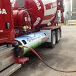 An Ozinga cement truck is fueled with CNG during the NGVi training event June 4, 2013 in Des Plaines, Ill. The training course talked fleet managers and service providers how NG vehicles work and how they need to be maintained.