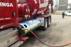 An Ozinga cement truck is fueled with CNG during the NGVi training event June 4, 2013 in Des Plaines, Ill. The training course talked fleet managers and service providers how NG vehicles work and how they need to be maintained.