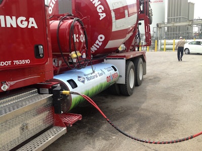 An Ozinga cement truck is fueled with CNG during the NGVi training event June 4, 2013 in Des Plaines, Ill. The training course talked fleet managers and service providers how NG vehicles work and how they need to be maintained.