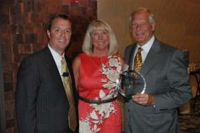 Randall-Reilly President Brent Reilly presented TEC Equipment’s Ann Thompson and David Thompson with the inaugural Successful Dealer Award Wednesday night.