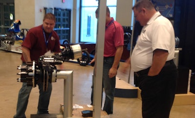 Dustin Stephens, a technician from Rush’s recent acquisition in St. Louis, was one of several technicians on-hand who competed for a $350 prize and title of Top Professional Brake Replacer for 2013.