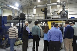 Students gather for a dynamometer presentation during a previous TMD Friction training course.