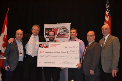 Phillips Industries presents a check for more than $18,000 to the SickKids Foundation at last month’s HDDC meeting in Quebec.