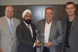 Truck Centers, Inc. was named the 2014 Successful Dealer Award recipient Wednesday night. Pictured above are Automann sales manager Mike Baker, Automann president Dennis Khanduja and Truck Centers, Inc. Mike Yates and Justin Hopkins.