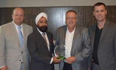 Truck Centers, Inc. was named the 2014 Successful Dealer Award recipient Wednesday night. Pictured above are Automann sales manager Mike Baker, Automann president Dennis Khanduja and Truck Centers, Inc. Mike Yates and Justin Hopkins.