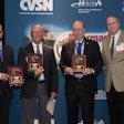 From left: Ian Johnston, Dave Scheer and Marc Karon are presented plaques by CVSN President Dave Willis for their efforts in helping to create a heavy-duty access to repair information MOU.