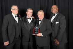 Meritor’s Marty Hetherington, Gene Evans, Tim Bauer and Keith Evans accepting the Spirit Award at last month’s banquet.
