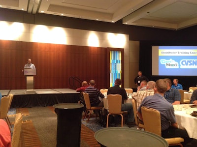 GenNext President Ian Johnston of Harman HVS speaks at the Opening Session of the GenNext, CVSN Distributor Training Expo Saturday in Atlanta.