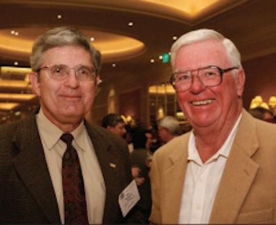 Jim Moss (right) with former Motor & Equipment Manufacturers Association President Bob McKenna at an earlier Heavy Duty Aftermarket Week. Moss was one of several industry members who helped create HDAW.