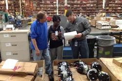 Brandon Woodard (right), second shift facilitator, Value Added Services, at Meritor, speaks with his team members on May 18 at Meritor’s Aftermarket Distribution Center in Florence, Ky. An Army combat veteran, Woodard is the first Wyakin Warrior alum to be hired in the heavy-duty aftermarket.