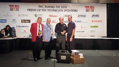 Eric Vos, right, is presented with his second consecutive TMC SuperTech championship Wednesday at the TMC fall meeting in Raleigh, N.C.