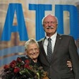 Sharon Nuss (left) joins her husband on stage after he was named 2017 Truck Dealer of the Year at the ATD convention in New Orleans. Photo courtesy ATD.