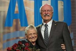 Sharon Nuss (left) joins her husband on stage after he was named 2017 Truck Dealer of the Year at the ATD convention in New Orleans. Photo courtesy ATD.