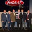 Rush Enterprises earned Peterbilt’s Red Oval award at the OEM’s recent dealer meeting.