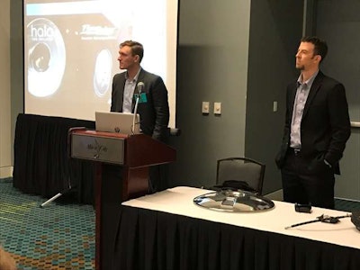 Aperia CEO Josh Carter (left) and FlowBelow President Josh Butler announce their new partnership Sunday at TMC.