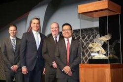 From left, Kevin Baney, Kenworth assistant general manager for sales and marketing; Mike Dozier, Kenworth general manager and PACCAR vice president; Mike Clark, CSM Truck Division president; and Jim Moeller, CEO of CSM Companies, Wisconsin Kenworth’s parent company.