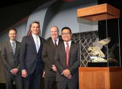 From left, Kevin Baney, Kenworth assistant general manager for sales and marketing; Mike Dozier, Kenworth general manager and PACCAR vice president; Mike Clark, CSM Truck Division president; and Jim Moeller, CEO of CSM Companies, Wisconsin Kenworth’s parent company.