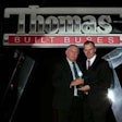 Thomas Bus Sales of Georgia General Manager Ken Lane (pictured left) receives Platinum Club dealership award from Thomas Built Buses CEO Caley Edgerly during the Thomas Bus Dealer Meeting in Dallas, Texas on April 1, 2017.