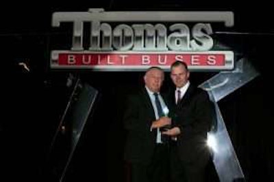 Thomas Bus Sales of Georgia General Manager Ken Lane (pictured left) receives Platinum Club dealership award from Thomas Built Buses CEO Caley Edgerly during the Thomas Bus Dealer Meeting in Dallas, Texas on April 1, 2017.