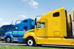 Multiple semi trucks parked