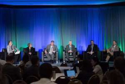 ACT Expo panel discussion on The Future of Heavy Duty Trucking. From left to right: Kary Schaefer, Daimler; Steve Gilligan, Navistar; Brian Lindgren, Kenworth; Jonathan Randall, Mack; and Bill Kahn, Peterbilt.