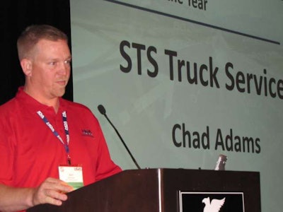 Bob Harper speaks after winning the Truck Service Expert of the Year award at the HDA Truck Pride Annual Meeting.
