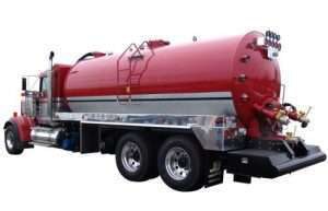 Truck with a pressure vacuum tank