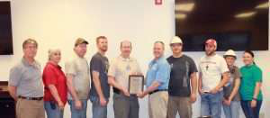 Utility Trailer Manufacturing Company employees receiving award