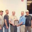 Utility Trailer Manufacturing Company employees receiving award