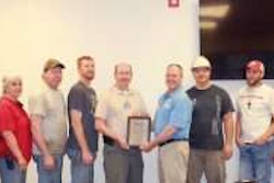 Utility Trailer Manufacturing Company employees receiving award