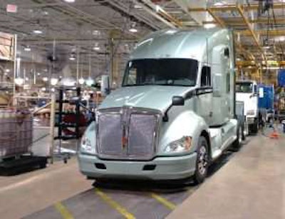 Kenworth truck on the floor of a plant