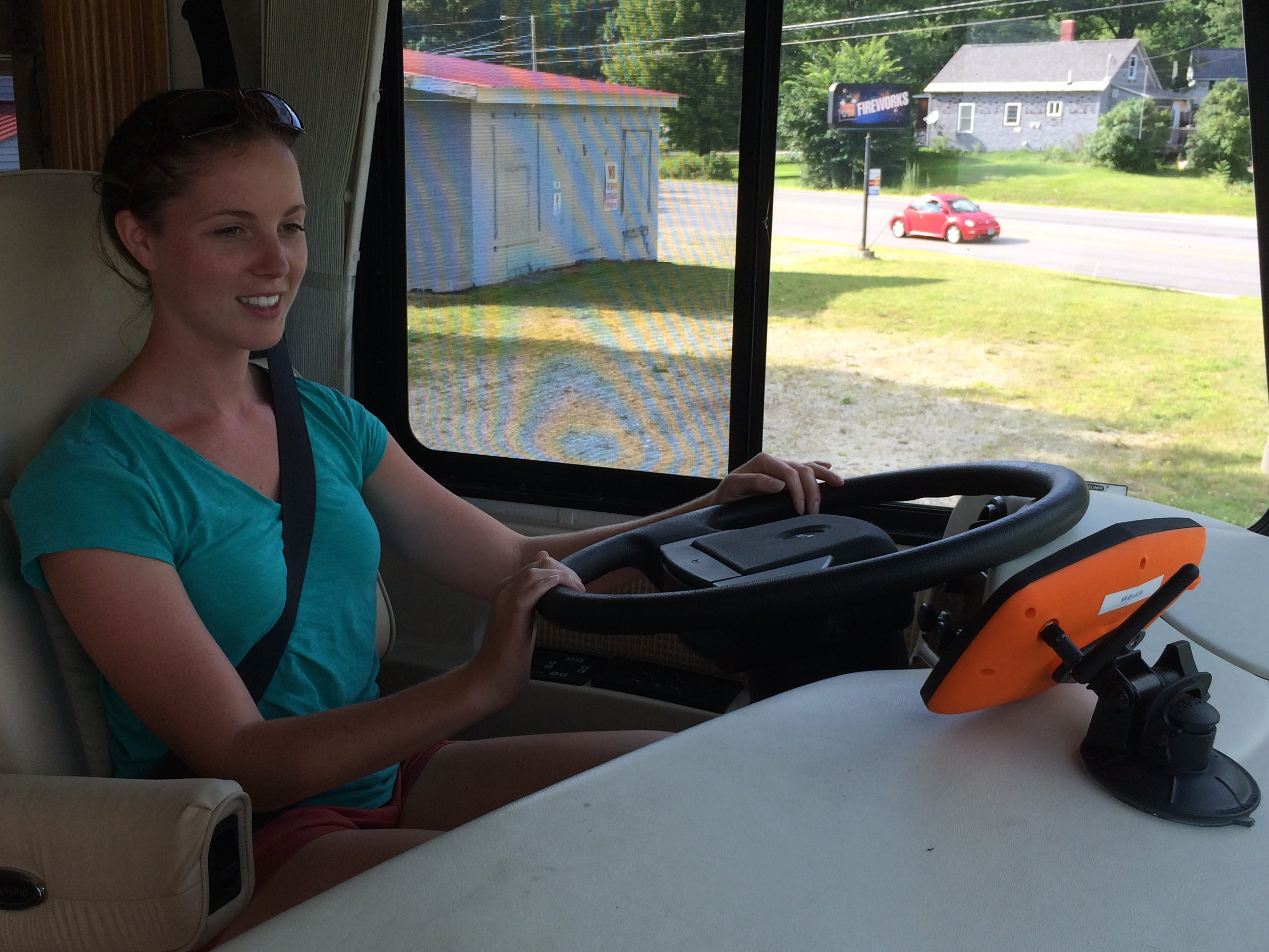 Truck driver with camera in a truck cab