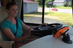 Truck driver with camera in a truck cab