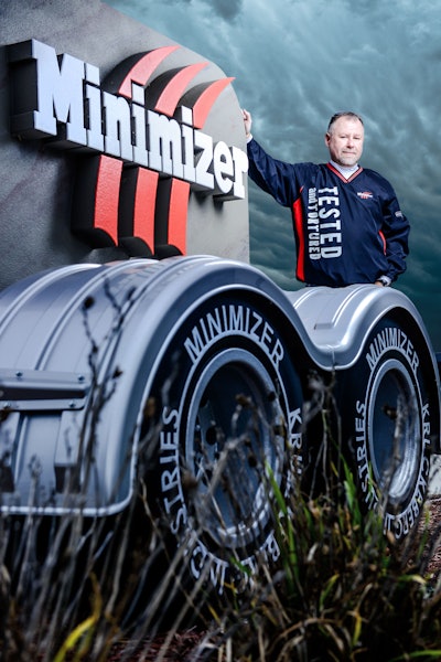 Man standing with Minimizer trailer