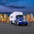 kenworth truck with city back drop