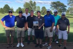 members accepting vendor of the year award