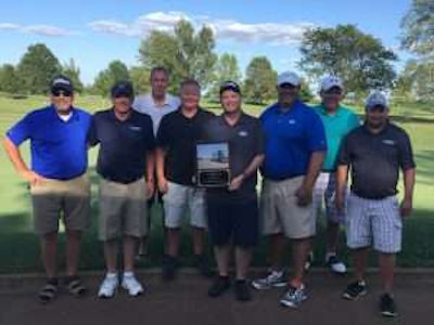 members accepting vendor of the year award