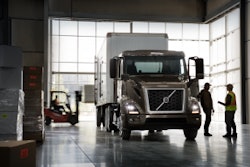 Volvo semi truck in a bay garage